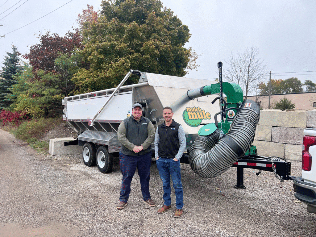 Landscaping professionals with innovative equipment for efficient outdoor solutions.